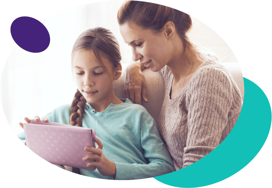 Parent and kid using tablet together