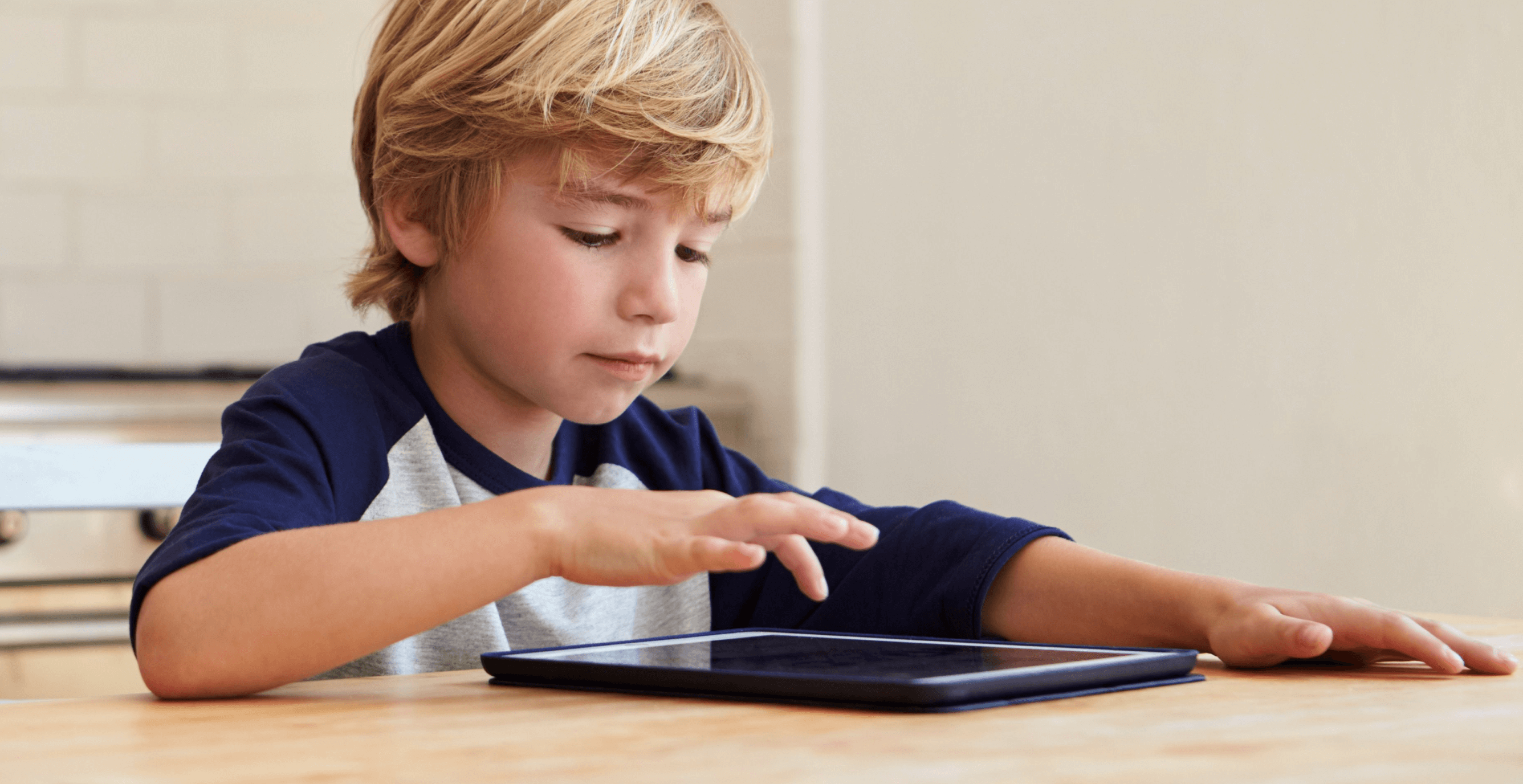 boy-with-ipad-table