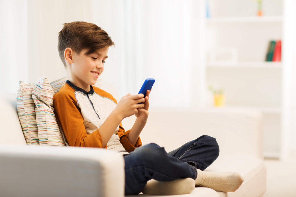 Boy using smartphone