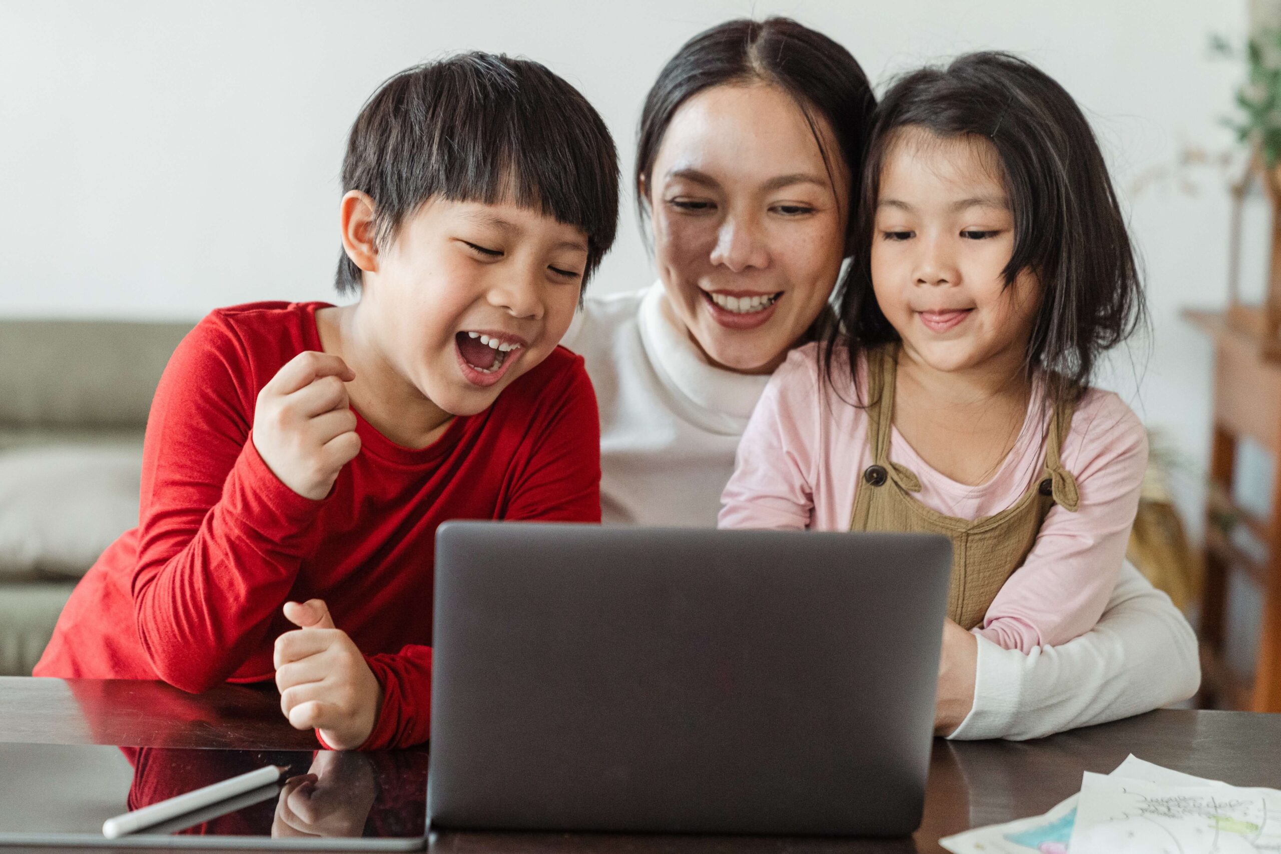 Family watching a laptop