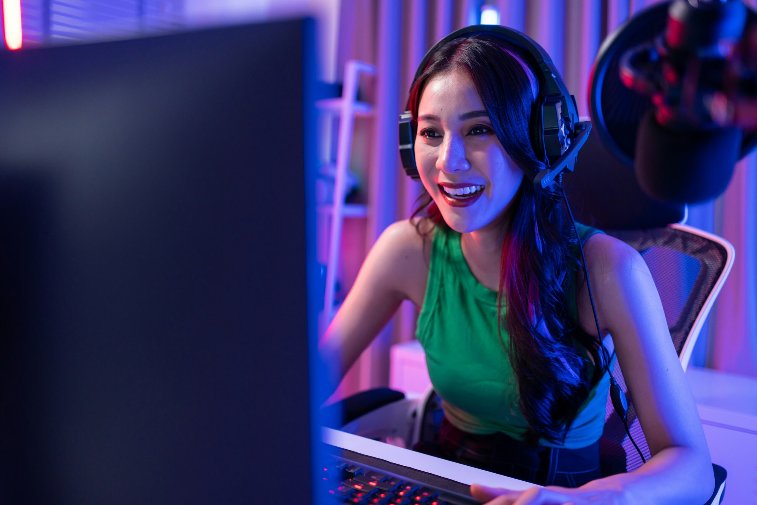 Image of excited girl playing and streaming video games